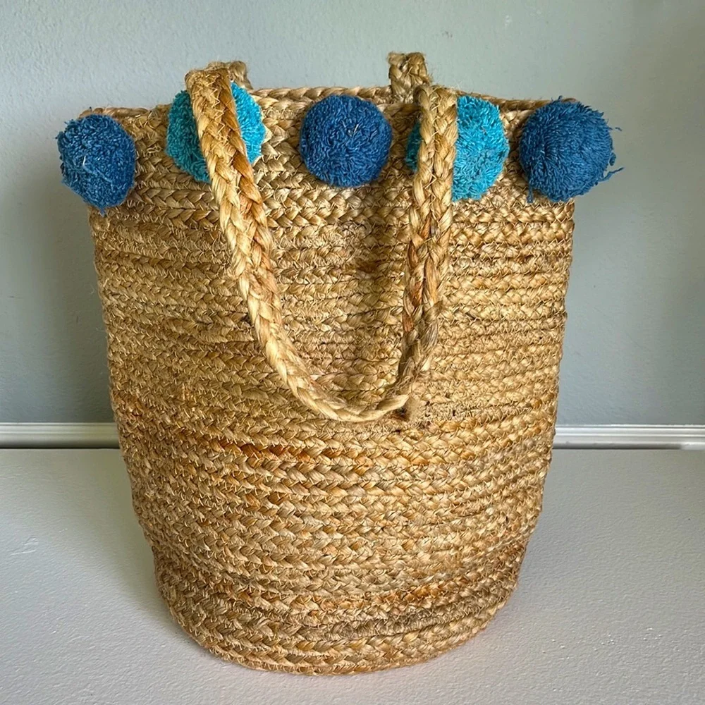 - Anthropologie Jute Braided Tote bag with  Pom Pom